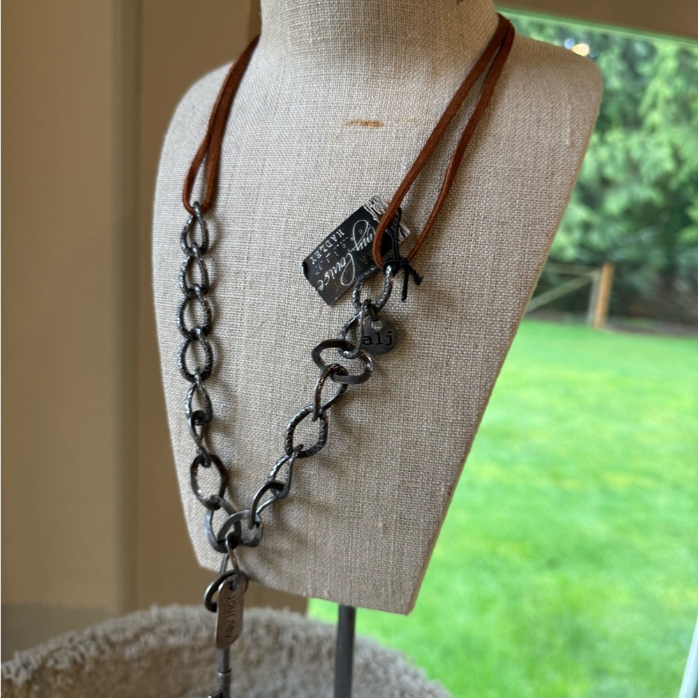 Chunky silver toned chain with key and affirmation charms